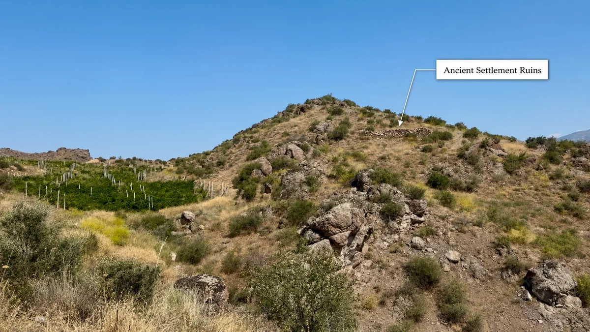 Ancient settlement ruins on the estate hillside